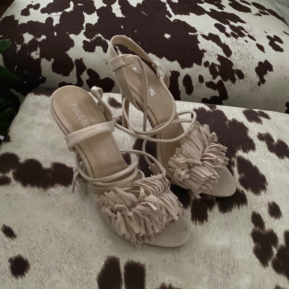 Tan tie up sandals 
Faux suede
